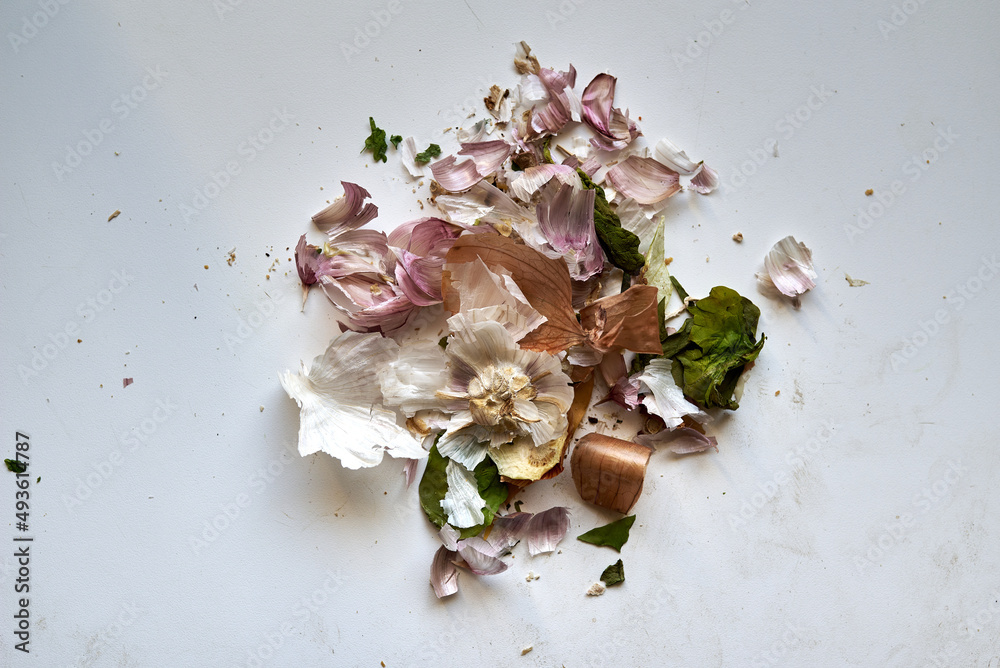 leftovers from peeled vegetables when creating a meal on the kitchen table