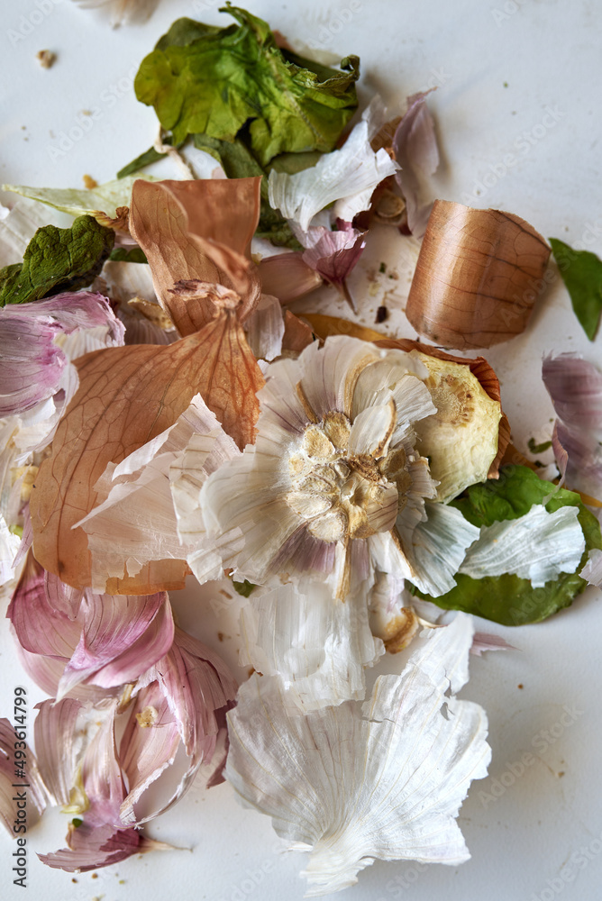 leftovers from peeled vegetables when creating a meal on the kitchen table