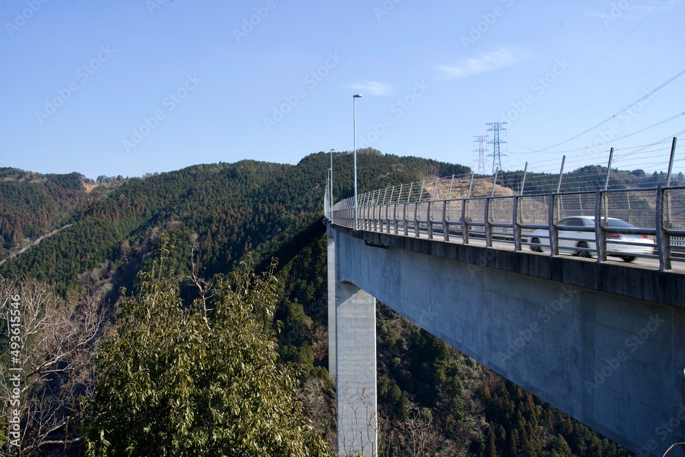 The Shintabiashi bridge and view of Japanese mountains in Gifu.