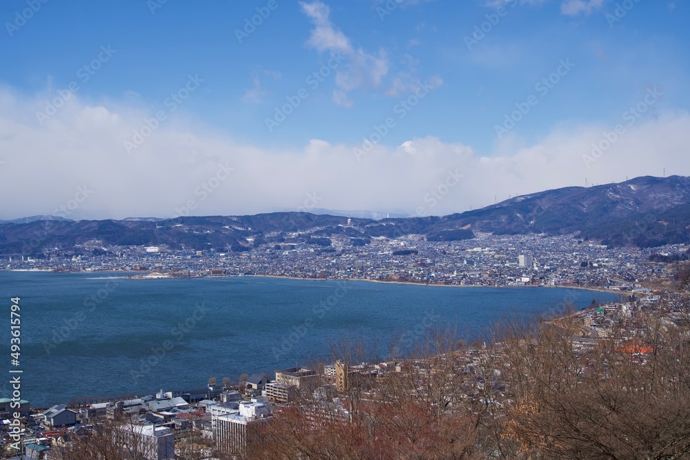The view of Lake Suwa with cloud in winter.