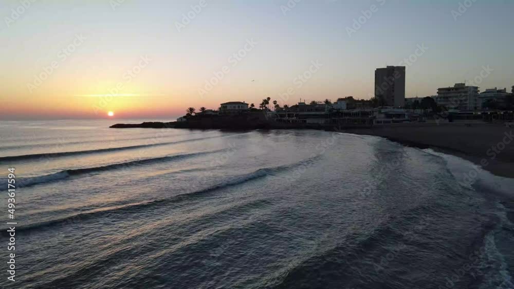 The day begins on the beach. Aerial Views from Playa del Arenal, Javea, Marina Alta in Alicante, Spain The day begins on the beach. Aerial Views from Playa del Arenal, Javea, Marina Alta in Alicante, Spain