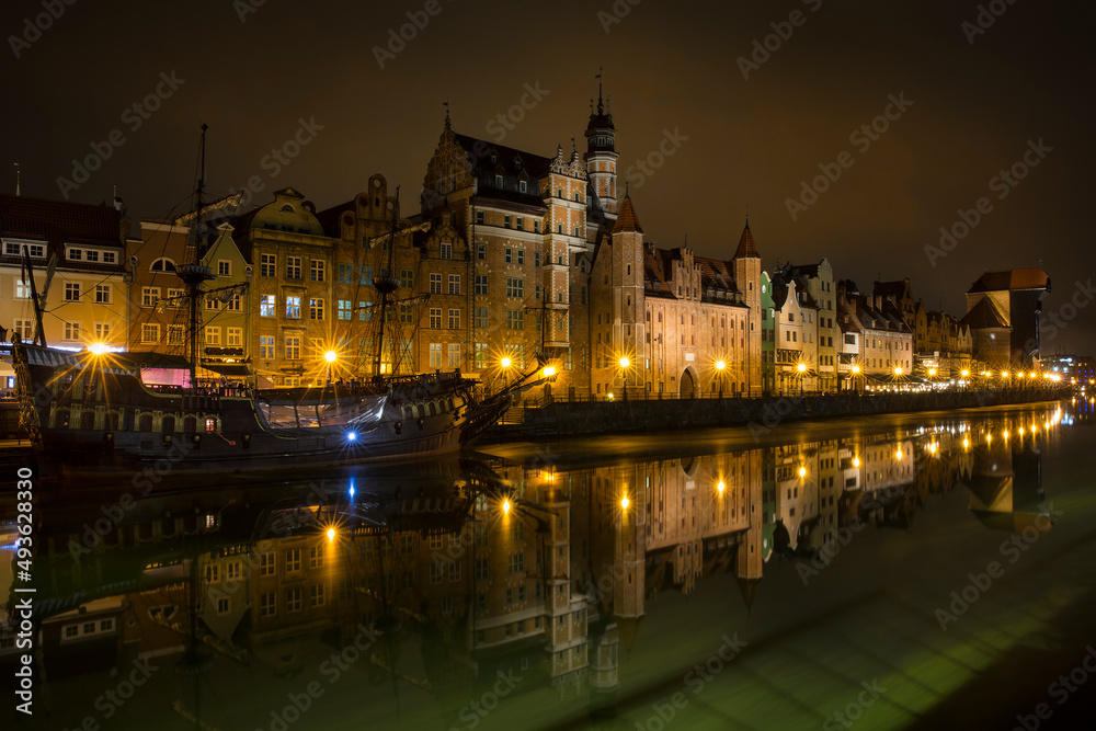 Nightshot of St Mary's Gate and Other Houses in the Old Town of Gdansk Reflecting in Motlawa River, Poland