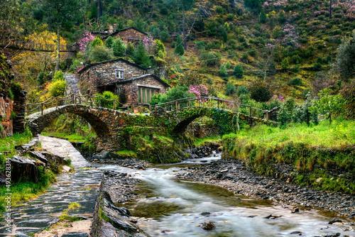 Traditional Houses and Bridges at Foz d'Egua, near Piodao, Portugal photo