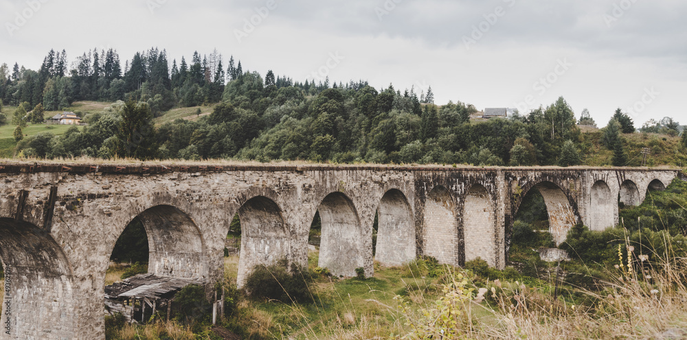 Old viaduct bridge in the mountain village Vorokhta