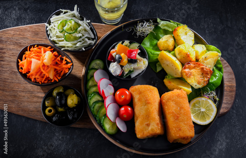 Breaded and deep-fried croquettes with potatoes and vegetables