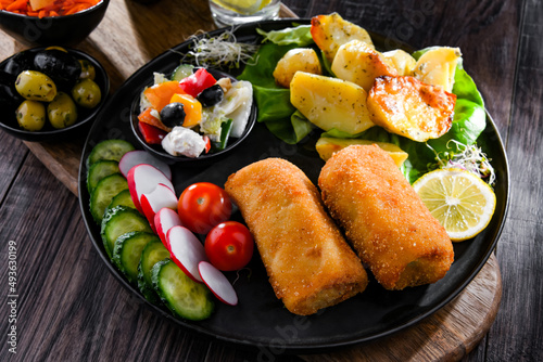 Breaded and deep-fried croquettes with potatoes and vegetables