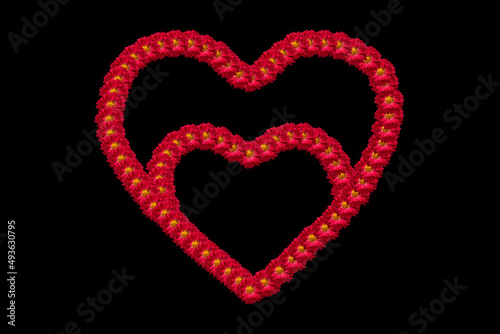Two hearts joined together as a symbol of love, family. Outlines of hearts framed by flower buds highlighted on a black background. Flower hearts as a symbol of loyalty