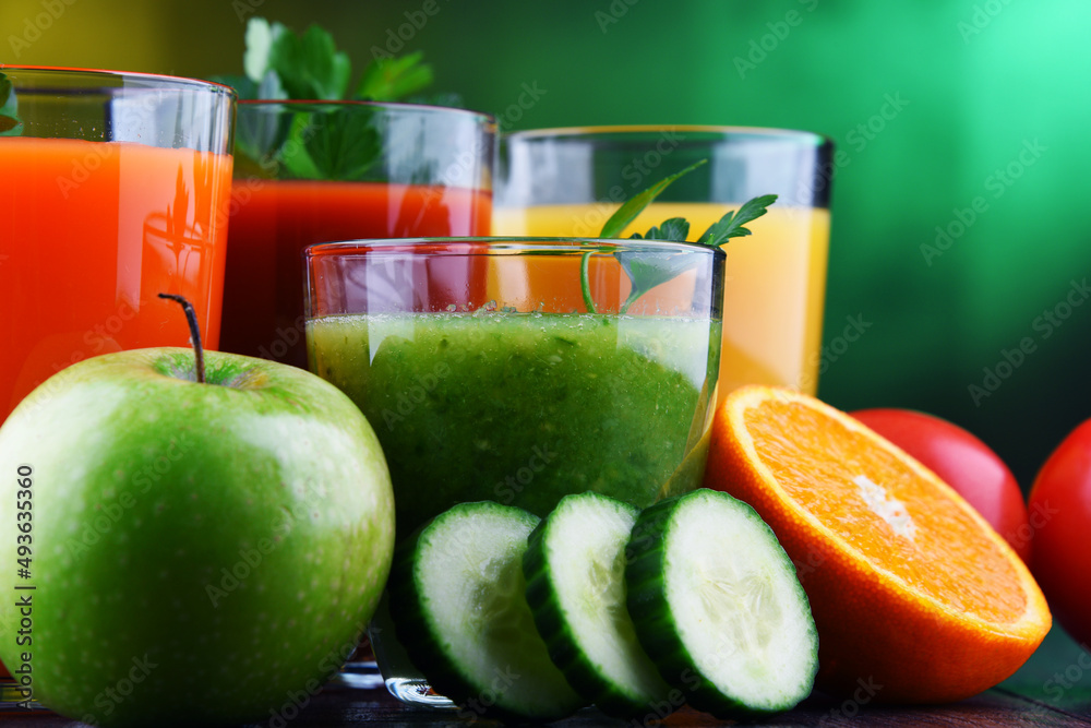 Glasses with fresh organic vegetable and fruit juices