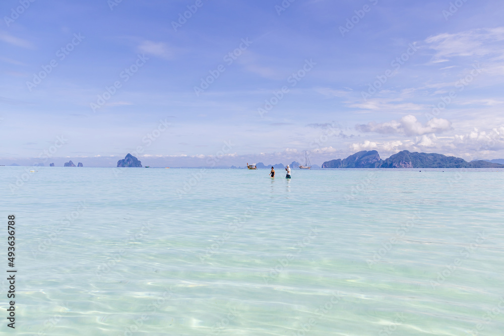 Crystal clear water and a very interesting snorkeling reef, that is swimmable from the beach at Koh Kradan in Trang, Thailand. 
