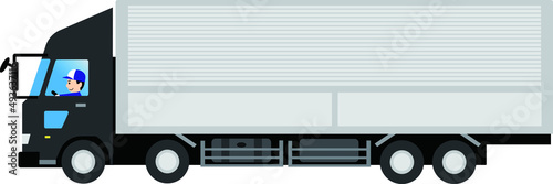 トラックを運転する男性ドライバー（大型・ウイングボディータイプ）