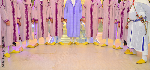 A musical group of Moroccan men wearing the Moroccan djellaba (Dakka Marrakchia). photo