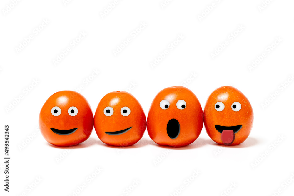 Obraz premium four anthropomorphic tomatoes with expressive faces on a white background