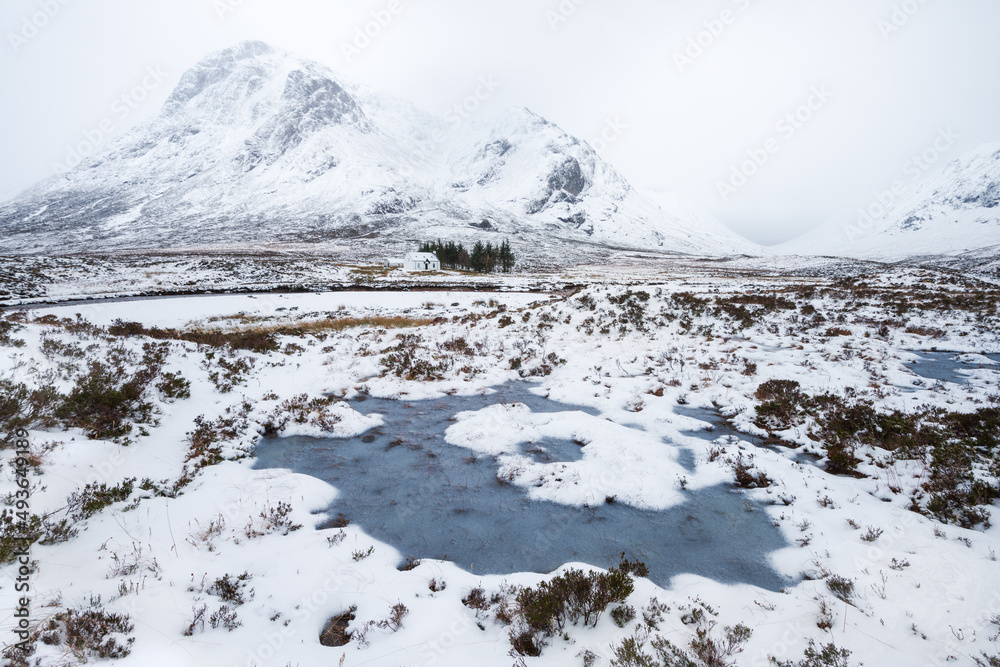 Winter wonderland at Glencoe with scenic view of the iconic Buachaille. Scottish Highlands, UK.