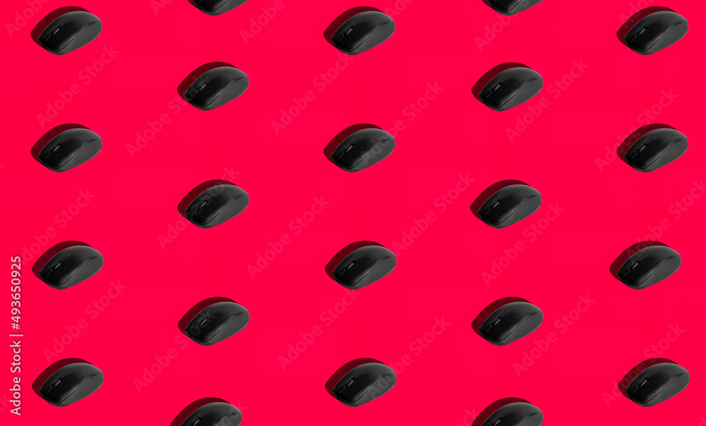 Isolated computer mouse on red background with hard shadow. Isolated computer mouse on red background with hard shadow.