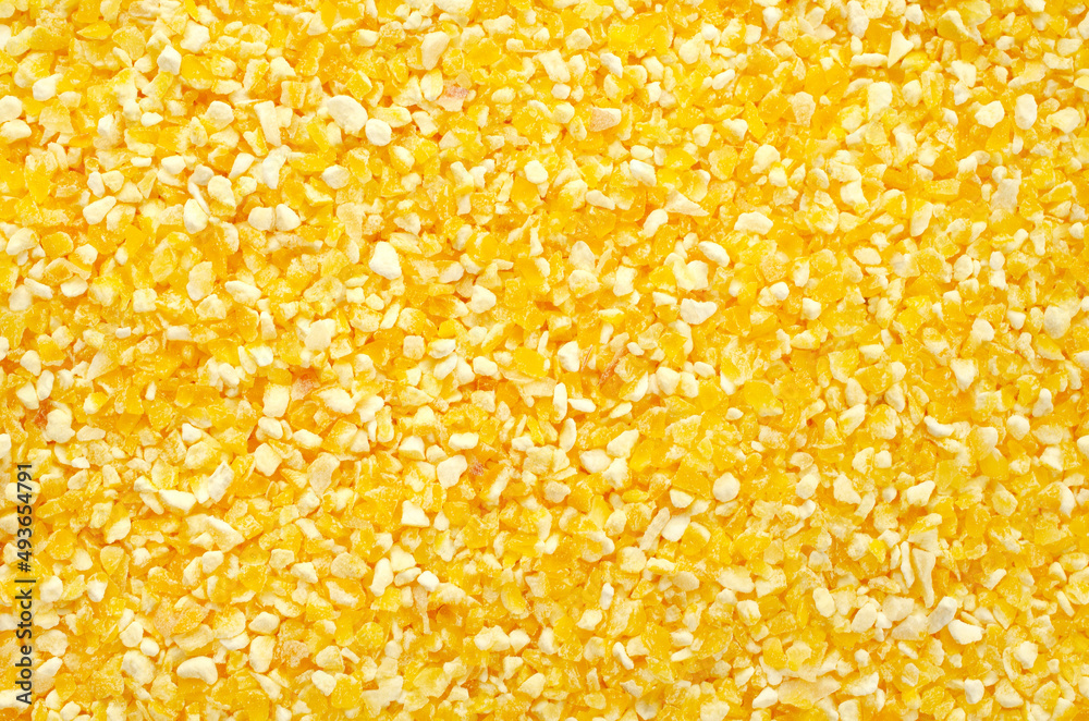 Texture of polenta, yellow cornmeal, top view. Polenta background, yellow cornmeal. Polenta or corn grits, texture, top view. Polenta, corn flour, background, texture, top view. Texture of polenta, yellow cornmeal, top view. Polenta background, yellow cornmeal. Polenta or corn grits, texture, top view. Polenta, corn flour, background, texture, top view.