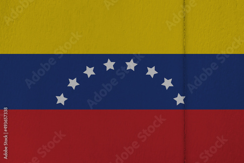 Patriotic wooden background in colors of national flag. Venezuela