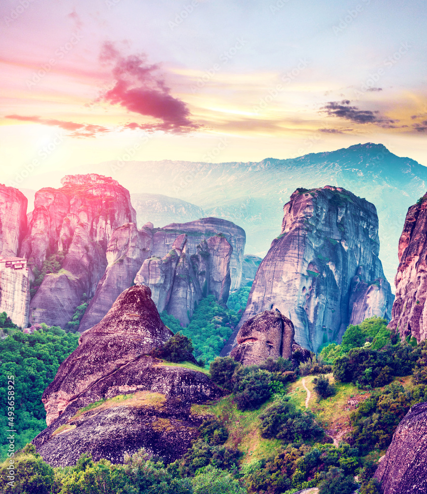 magnificent magical landscape in the famous valley of the Meteora rocks in Greece at sunset. Great amazing world. Attractions.