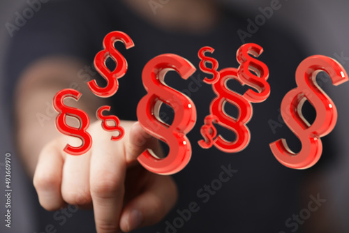 Hand mit Paragraf