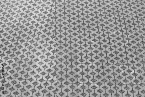 Eco-parking. Lawn grating for parking made of concrete. Black and white photo
