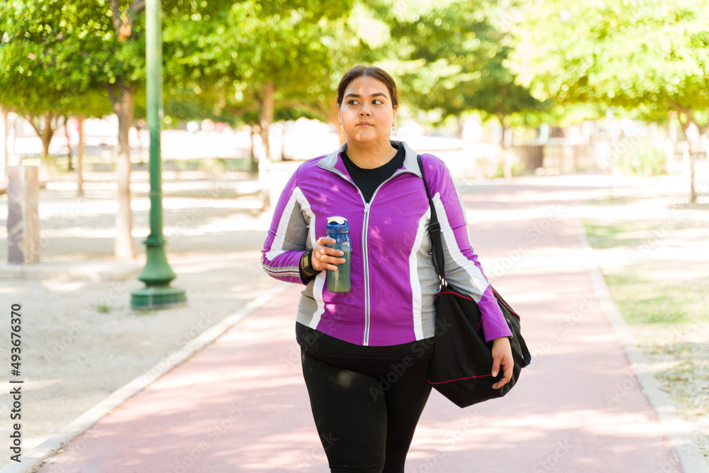 Curvy woman ready for her cardio exercises Curvy woman ready for her cardio exercises