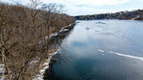 Calm river view along fox river as spring approaches