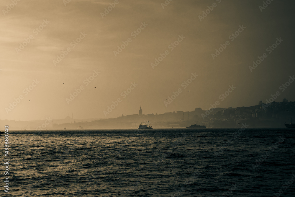 Istanbul background photo. Sepia colored Istanbul background at foggy weather.
