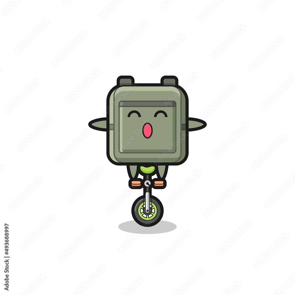 The cute school bag character is riding a circus bike The cute school bag character is riding a circus bike