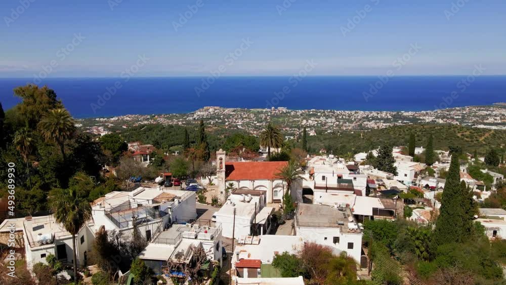 Aerial 4k view of fantastic Karmi Village in North Cyprus surrounded with amazing green nature and picturesque landscape of Kyrenia City. Aerial 4k view of fantastic Karmi Village in North Cyprus surrounded with amazing green nature and picturesque landscape of Kyrenia City.