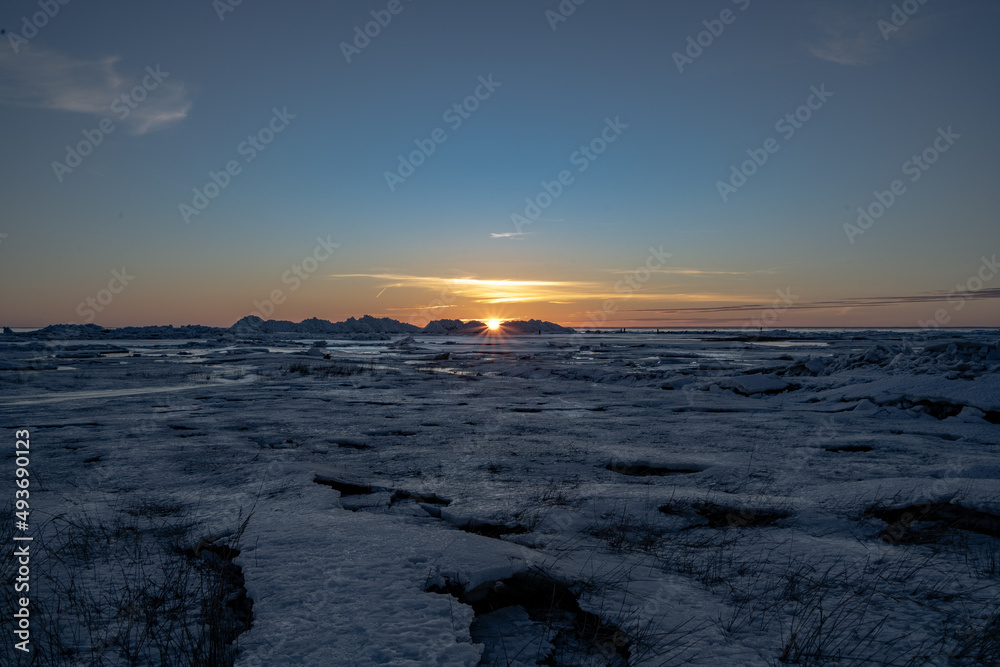 sunset over the frozen sea