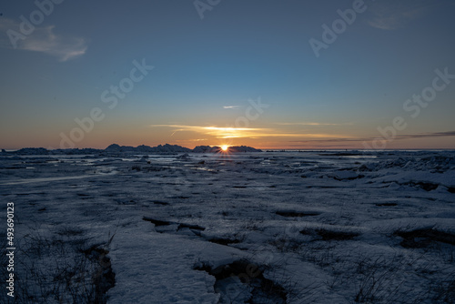 sunset over the frozen sea