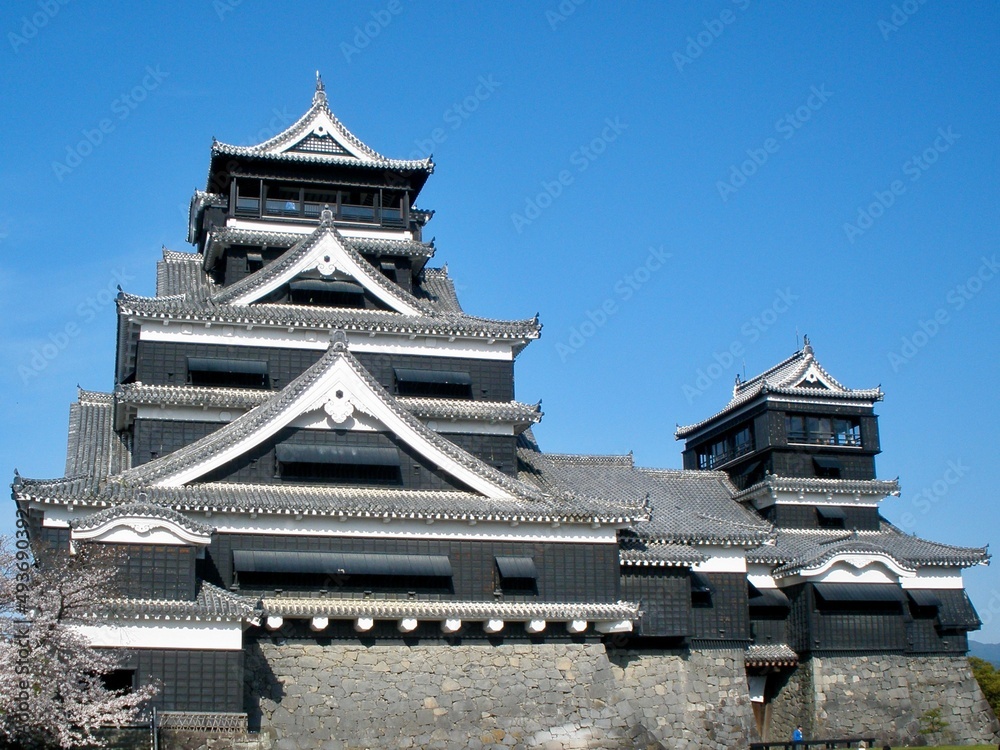 Japanese Castle - Kumamoto Kyushu Japan - Historical Architecture - Clear Blue Sky Japanese Castle - Kumamoto Kyushu Japan - Historical Architecture - Clear Blue Sky