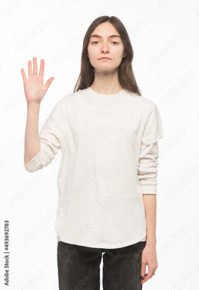 half-length portrait of a young Ukrainian girl who shows the number with her hands on a white background
half-length portrait of a young Ukrainian girl who shows the number with her hands on a white background
