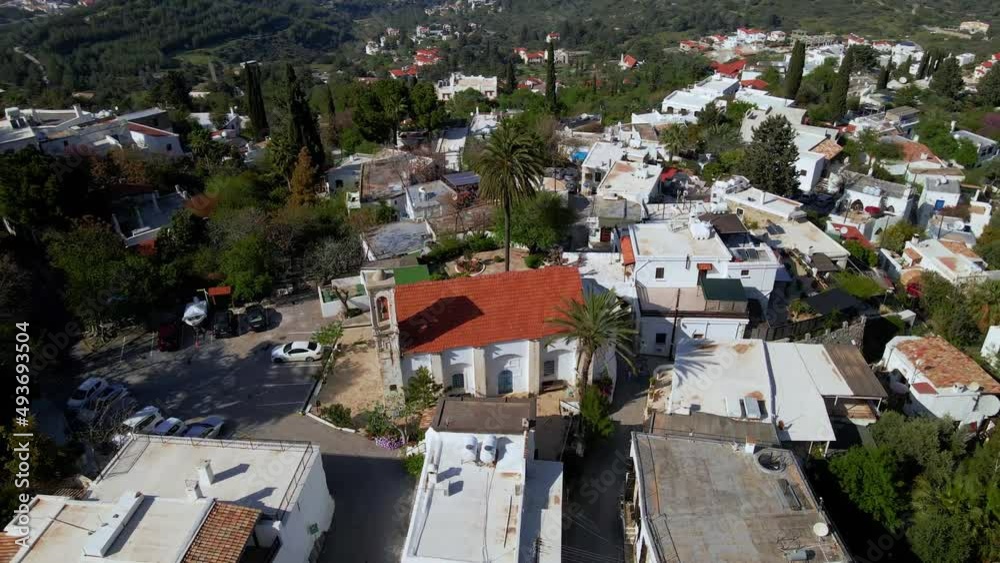 Aerial 4k view of fantastic Karmi Village in North Cyprus surrounded with amazing green nature and picturesque landscape of Kyrenia City. Aerial 4k view of fantastic Karmi Village in North Cyprus surrounded with amazing green nature and picturesque landscape of Kyrenia City.