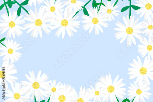 Frame of green stemmed daisies with copy space on blue background