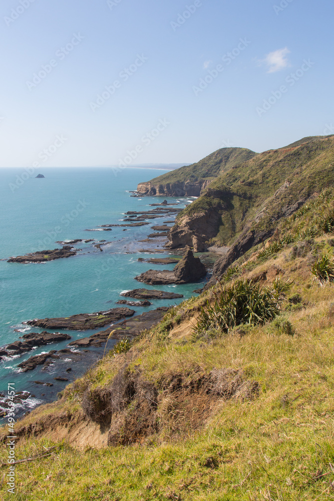 Marine Landscape. The view of rocky coastline at West Coast near Auckland, New Zealand. Marine Landscape. The view of rocky coastline at West Coast near Auckland, New Zealand.