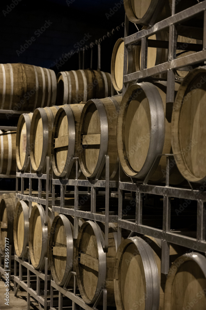 Production of sweet cassis creme liquor and strong marc from ripe black currant berries, distillation and maturation in wooden barrels. Burgundy, France Production of sweet cassis creme liquor and strong marc from ripe black currant berries, distillation and maturation in wooden barrels. Burgundy, France