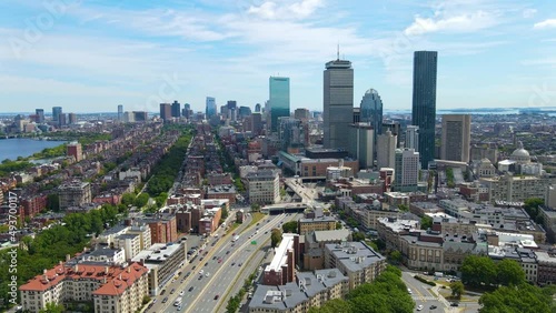 Boston Back Bay modern city skyline including John Hancock Tower, Prudential Tower, and Four Season Hotel at One Dalton Street in Boston, Massachusetts MA, USA.  