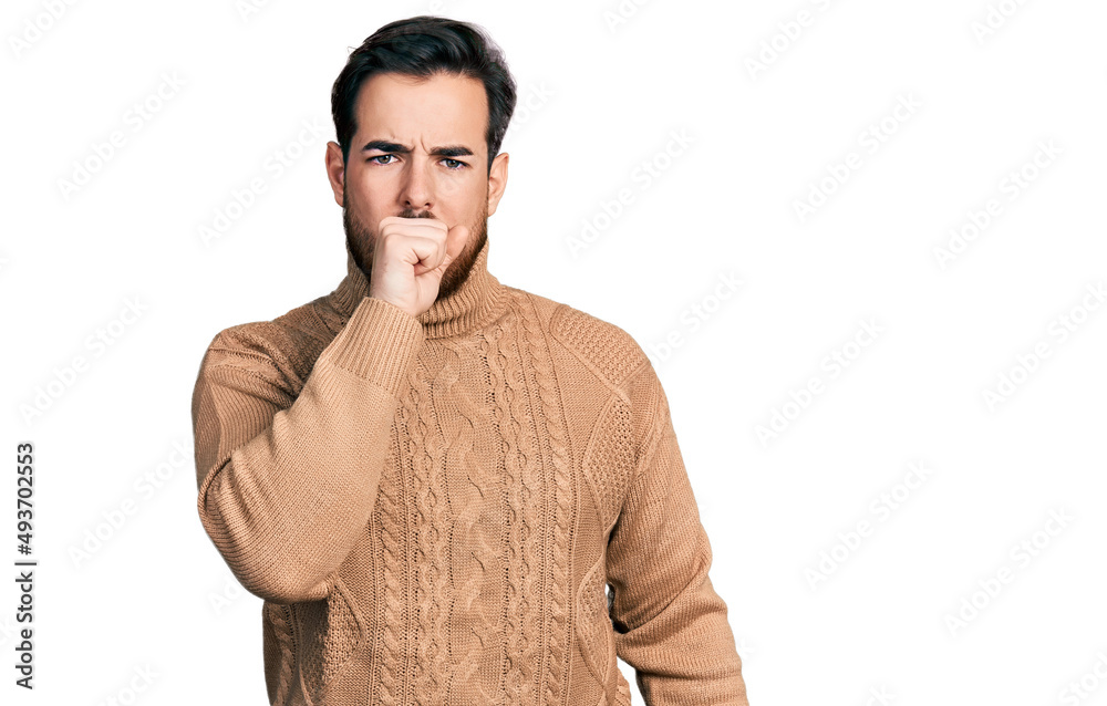 Young hispanic man wearing casual clothes feeling unwell and coughing as symptom for cold or bronchitis. health care concept. Young hispanic man wearing casual clothes feeling unwell and coughing as symptom for cold or bronchitis. health care concept.