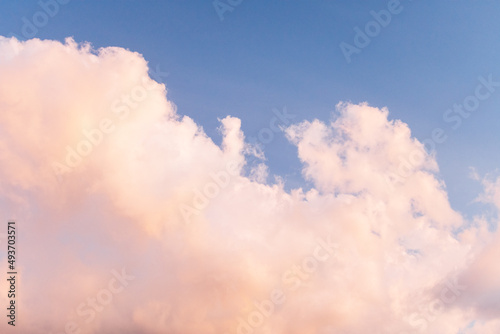 Fototapeta Naklejka Na Ścianę i Meble -  Pastel color sunset clouds, Blue Sky, Pink purple peach clouds, Serene background, Calming background