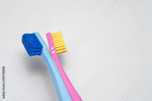 A conceptual of a couple toothbrush in love. Toothbrushes convey the human relationship between a man and a woman.