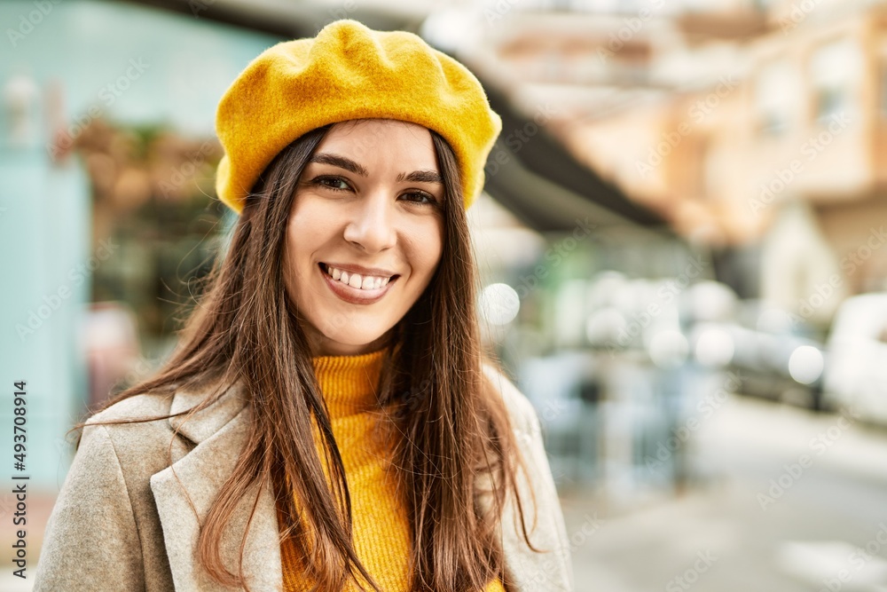 Young hispanic girl smiling happy standing at the city. Young hispanic girl smiling happy standing at the city.