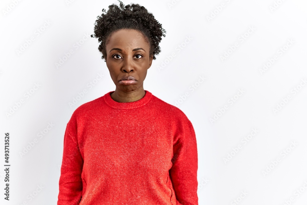 Young african american woman wearing casual clothes over isolated background depressed and worry for distress, crying angry and afraid. sad expression. Young african american woman wearing casual clothes over isolated background depressed and worry for distress, crying angry and afraid. sad expression.
