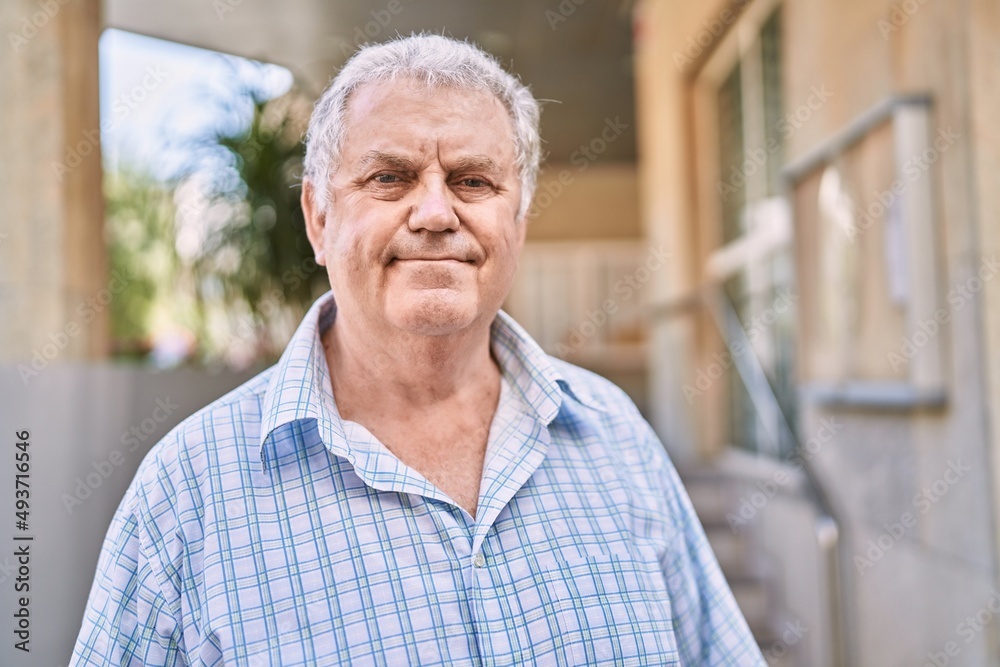 Middle age grey-haired man smiling confident walking at street Middle age grey-haired man smiling confident walking at street