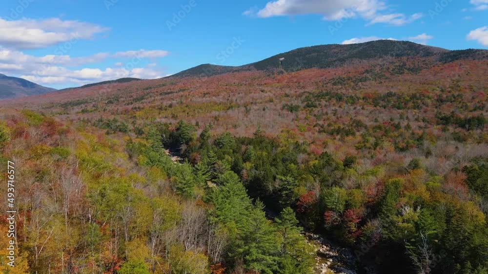 White Mountain National Forest and Pemigewasset River valley fall foliage on Kancamagus Highway at Lincoln Woods aerial view, Town of Lincoln, New Hampshire NH, USA. White Mountain National Forest and Pemigewasset River valley fall foliage on Kancamagus Highway at Lincoln Woods aerial view, Town of Lincoln, New Hampshire NH, USA.