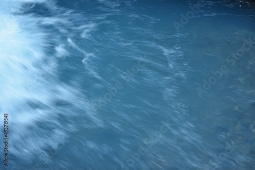 water surface of a blue river