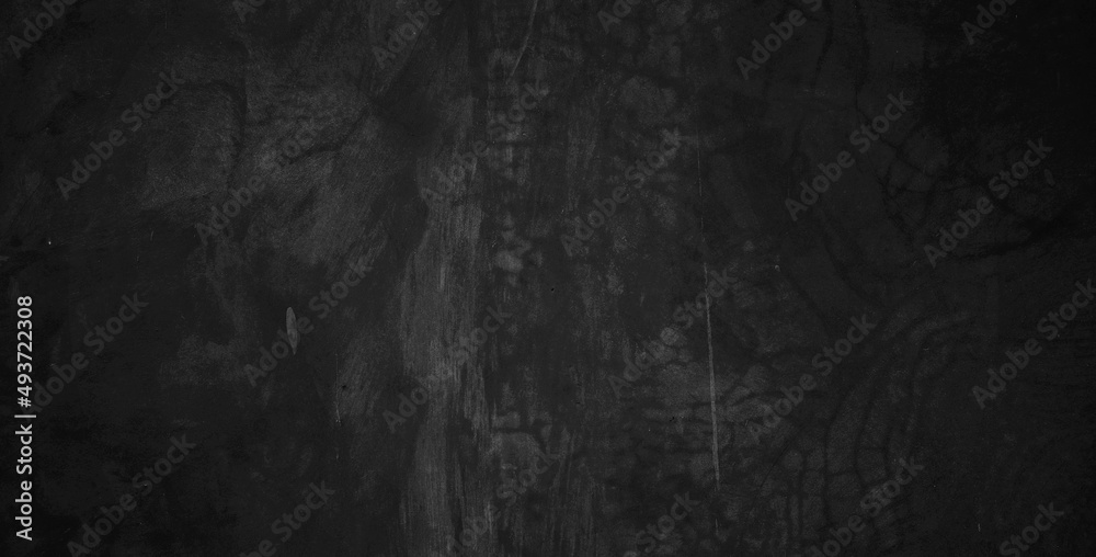 Black dark grunge background and texture of black concrete wall.