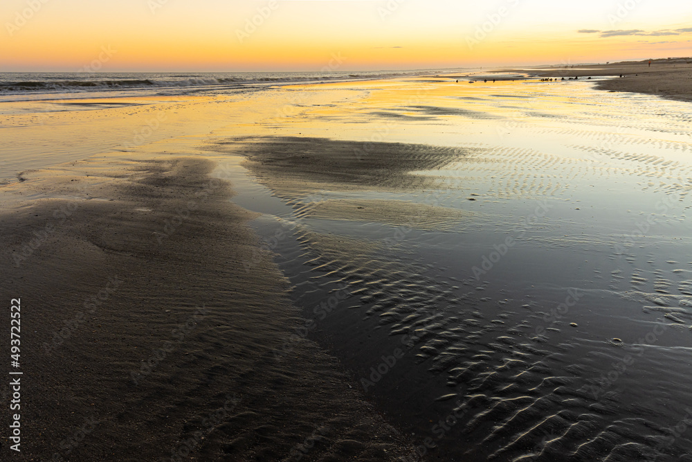 Sunset Over The Tidal Flats of Folly Beach, Folly Island, South Carolina, USA