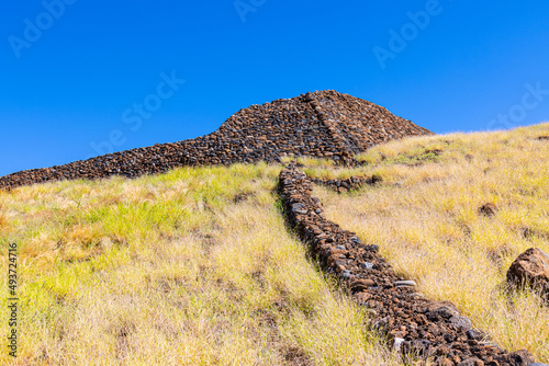 Lava Stone Fence Leading Uphill to Pu'ukohola Heiau National Historic Site, Hawaii Island, Hawaii, USA photo