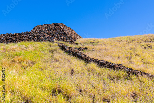Lava Stone Fence Leading Uphill to Pu'ukohola Heiau National Historic Site, Hawaii Island, Hawaii, USA photo