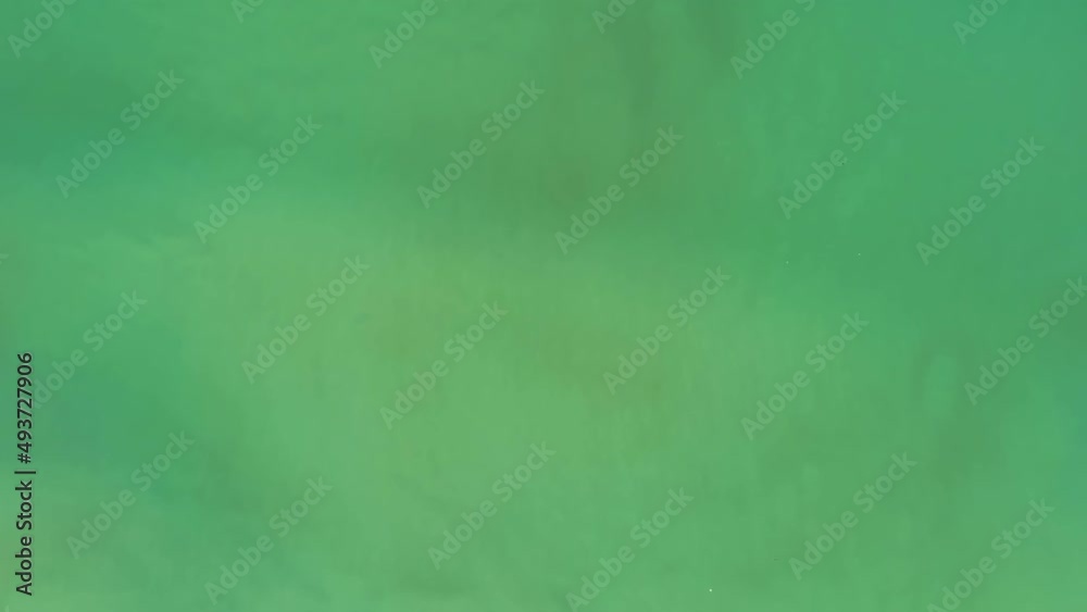 Sea surface beautiful waves Foaming and Splashing in the Ocean. Beautiful waves in open sea at Phuket Thailand Travel and tour background.Drone camera tilt up shot Sea surface beautiful waves Foaming and Splashing in the Ocean. Beautiful waves in open sea at Phuket Thailand Travel and tour background.Drone camera tilt up shot